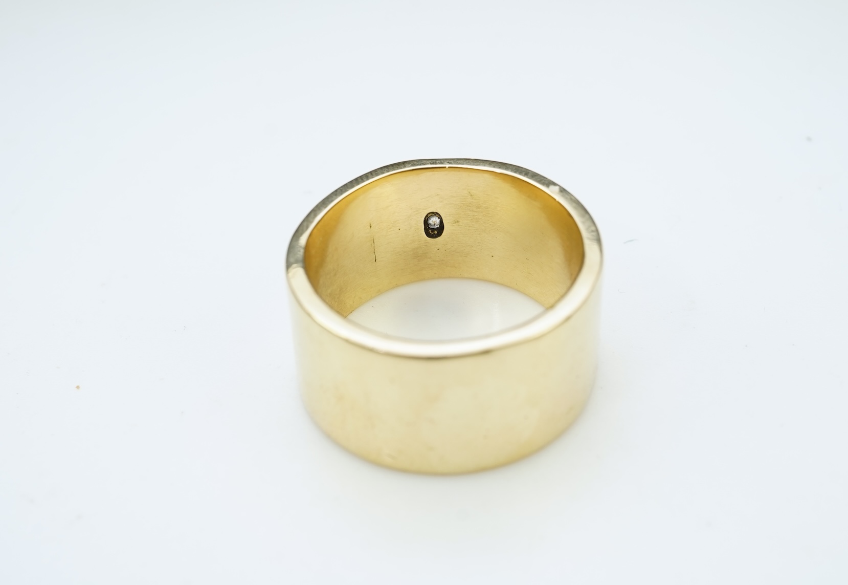 A gold and diamond ring